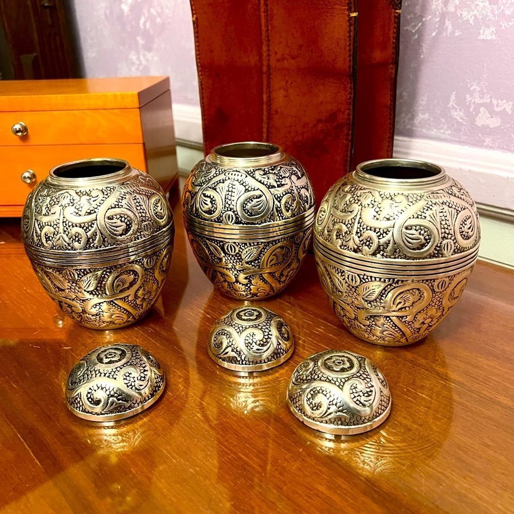 Beautifully engraved silver plated small urn for cremains.